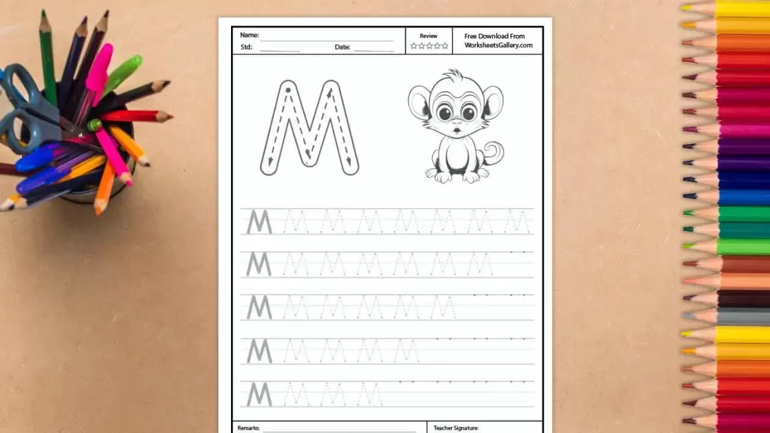 An educational printable featuring an uppercase letter M with tracing arrows and a black-and-white drawing of a wide-eyed monkey, flanked by colored pencils.