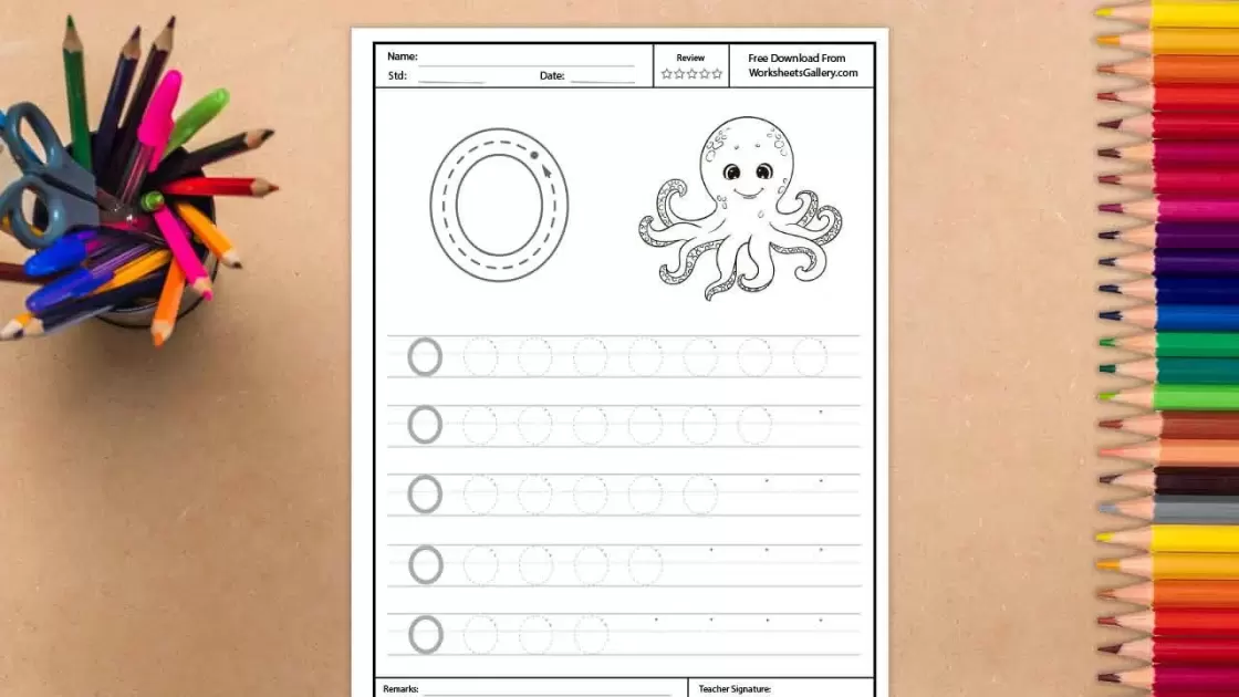A white worksheet for tracing the uppercase letter O and drawing an octopus, surrounded by a cup of colorful pencils and scissors on the left, and a vertical row of colored pencils on the ri
