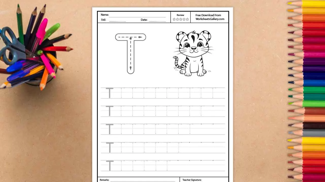 A white educational worksheet for tracing the uppercase letter T, featuring a large guide letter with directional arrows and a smiling cartoon tiger illustration, surrounded by a cup of colo