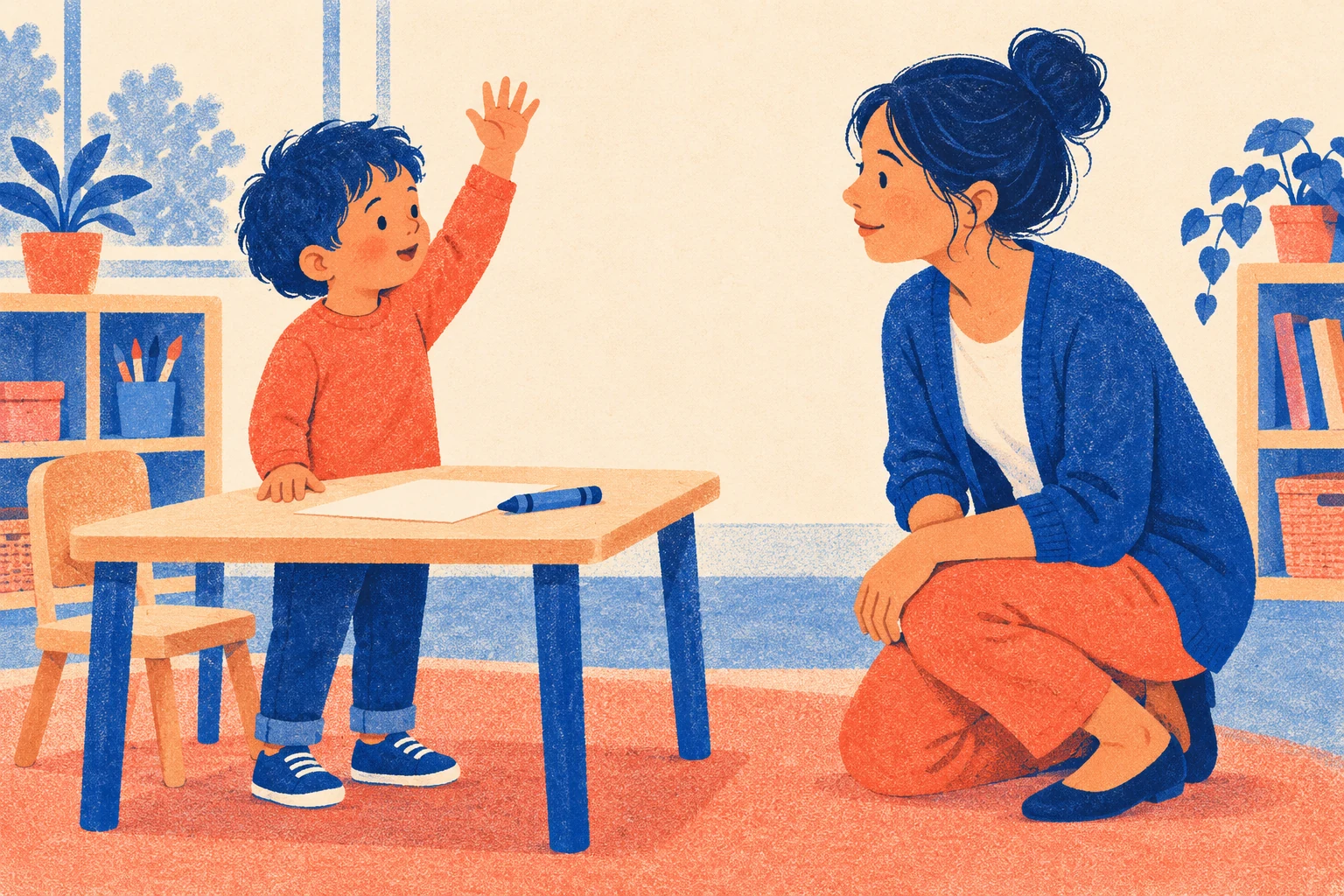 A child stands at the left raising one hand while a teacher kneels at the right and looks towards them.