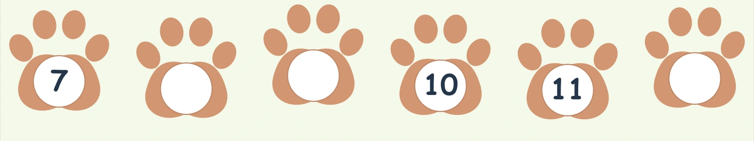Orange paw prints containing 7, 10 and 11 with the final center empty
