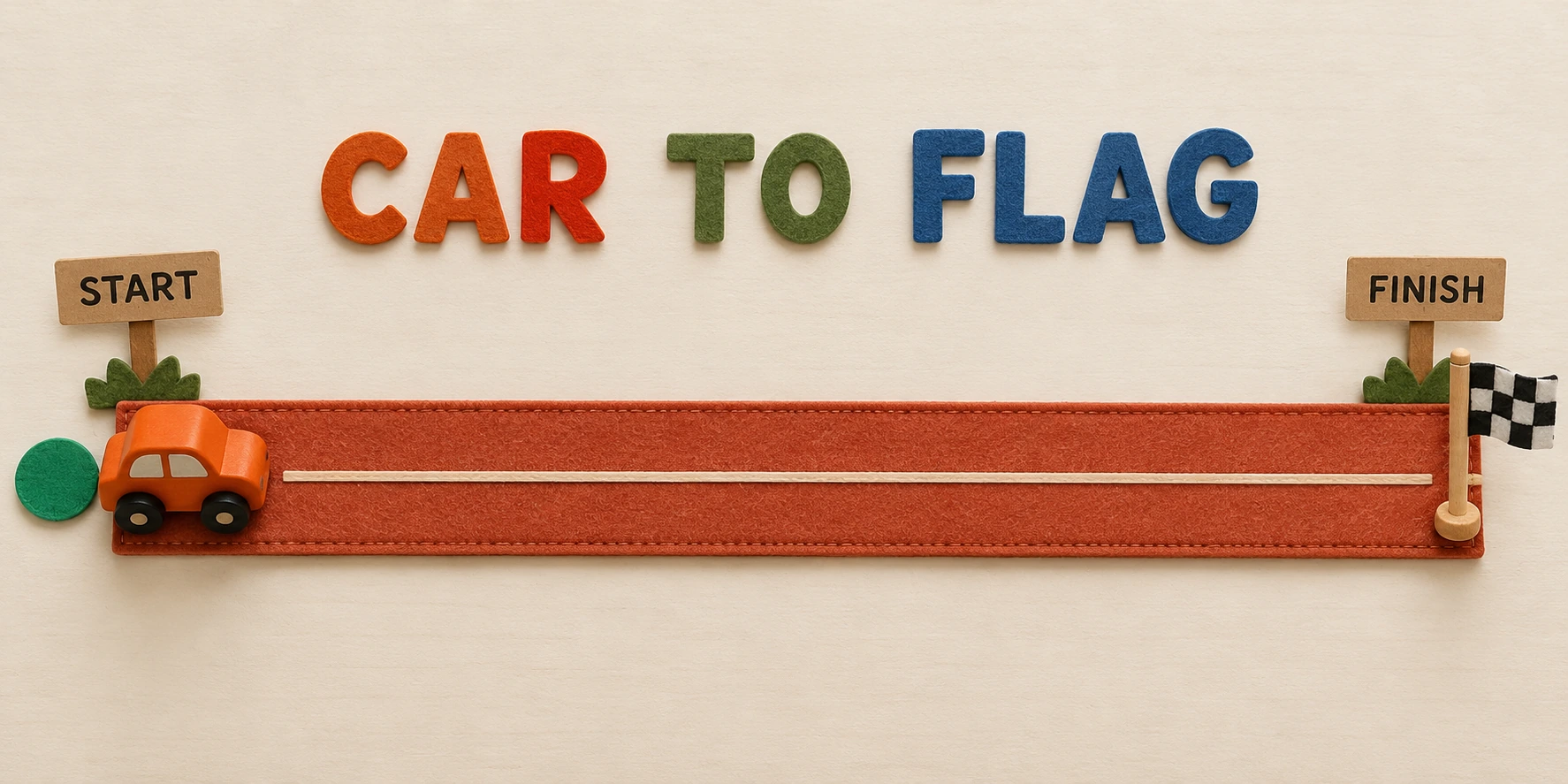 Orange toy car beside a straight road labelled CAR TO FLAG